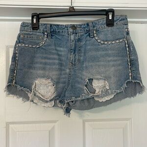 Free People - distressed embroidered medium wash blue Jean shorts - size 28